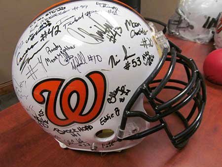 Washington Panthers helmet with signatures from the 2013 team