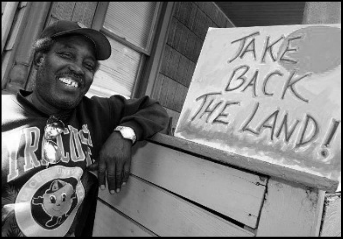 Eddie Windom-Bey Celebrates his Sweet Victory after a Successful Eviction Defense 2013 © Take Back the Land Rochester