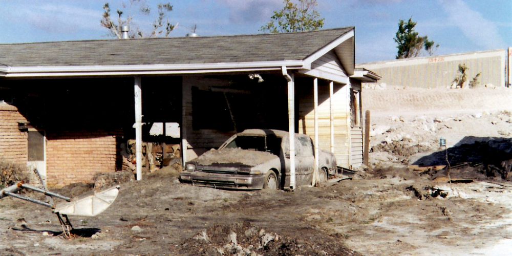 An abandoned house along Pratt Drive by the London Avenue Canal in New Orleans, near one of the levee breach sites. Photographed more than 2 months after the Hurricane Katrina.