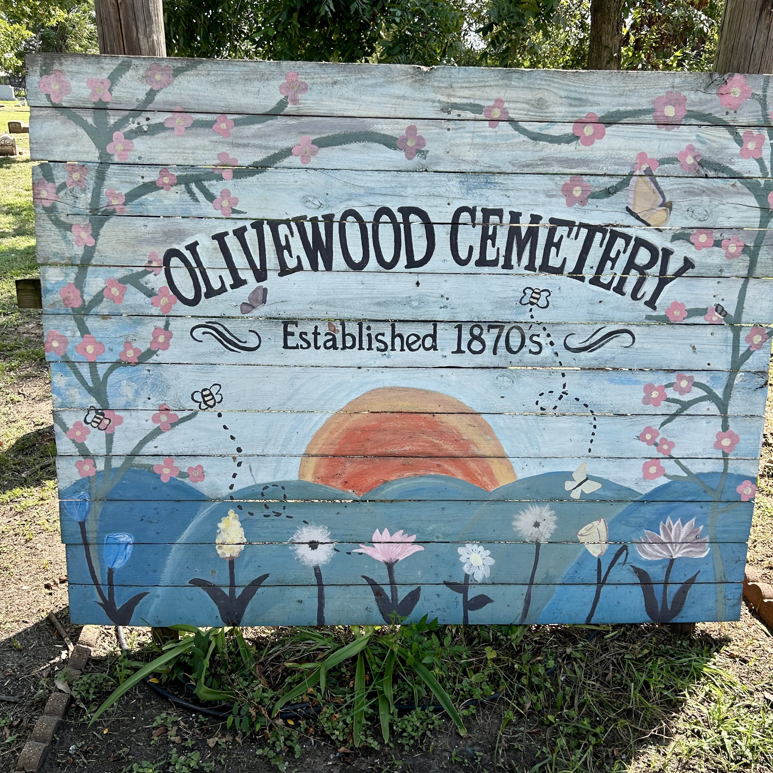 A handpainted sign, created by the Descendants of Olivewood, near the entrance of the cemetary. Source: Jennifer Rochon Blanks