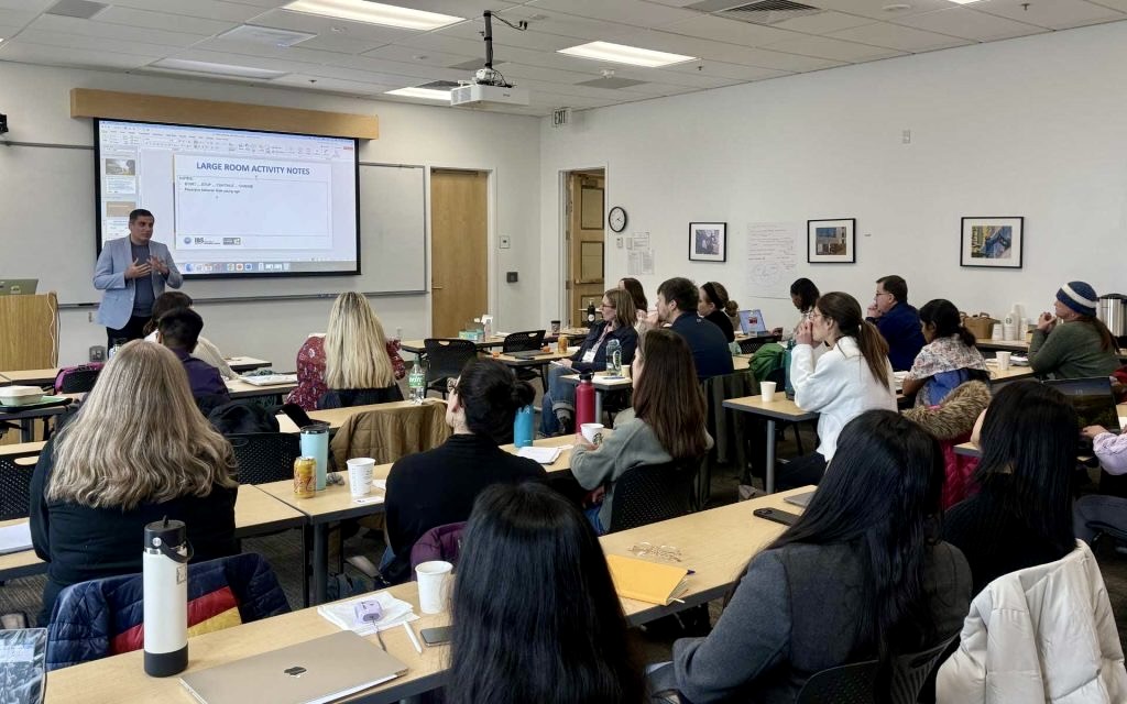 Amir Behzadan presents to attendees of the ASPIRE Workshop.