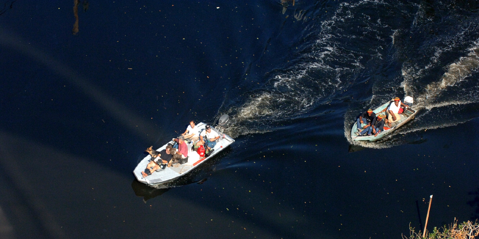 New Orleans residents travel through flooded streets by boat on September 7, 2005. Source: Jocelyn Augustino/FEMA.
