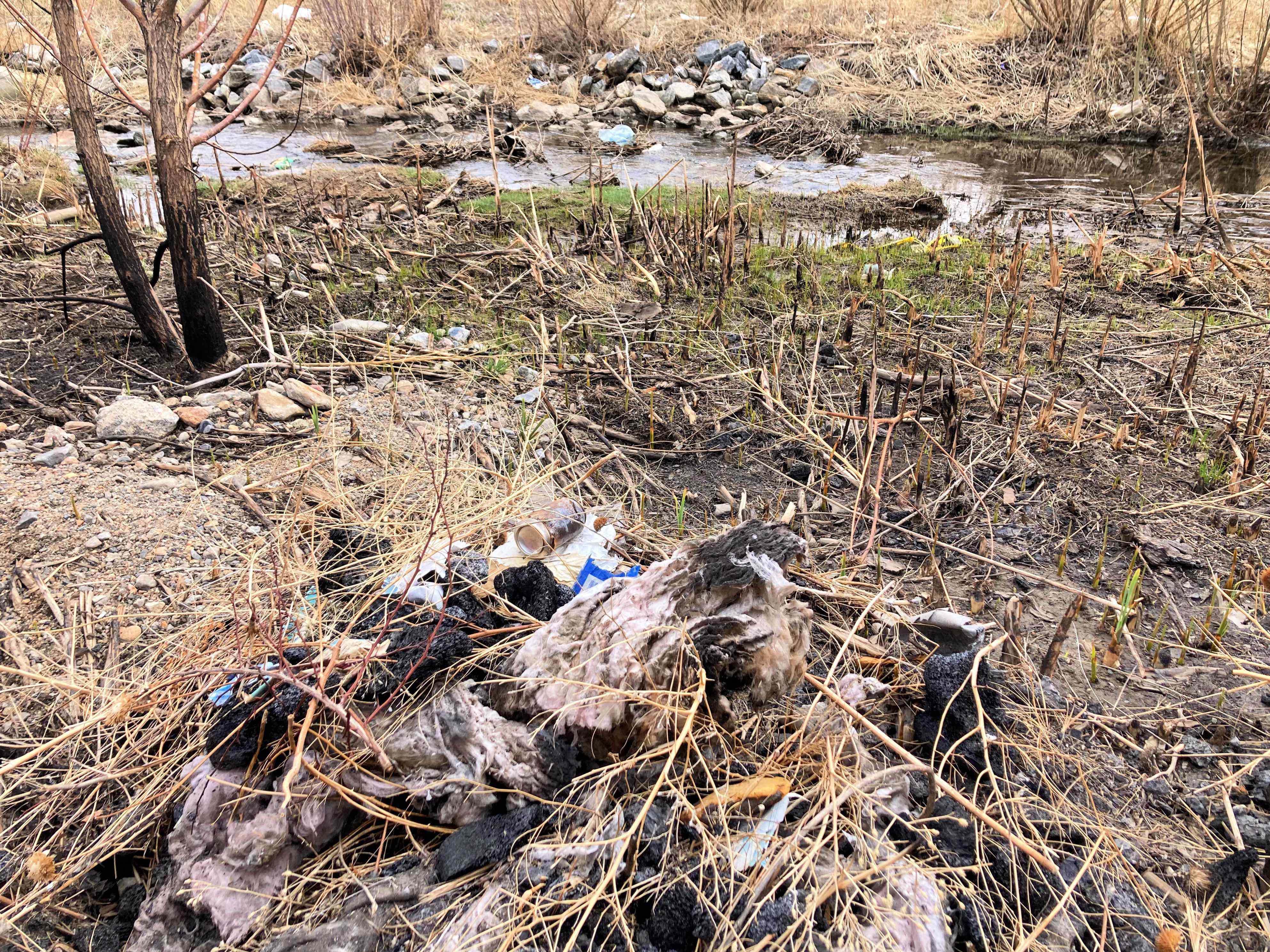 Fire debris in the stream in April 2022